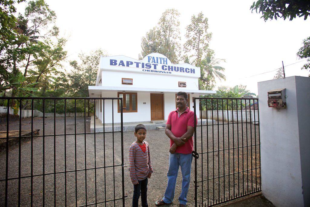 Ashland and Matthew in front of the church they donated the land for. 